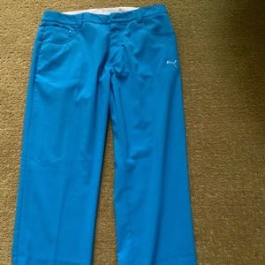 Men Puma golf pants. Size 32W 34L. Color blue.